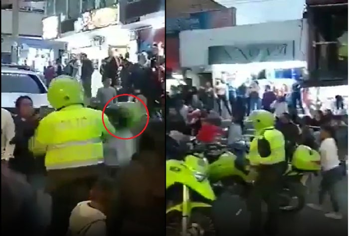 Policía le pega a una mujer con el casco en Usme