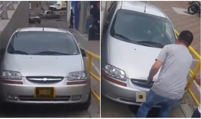 Carro atrapado en puente peatonal