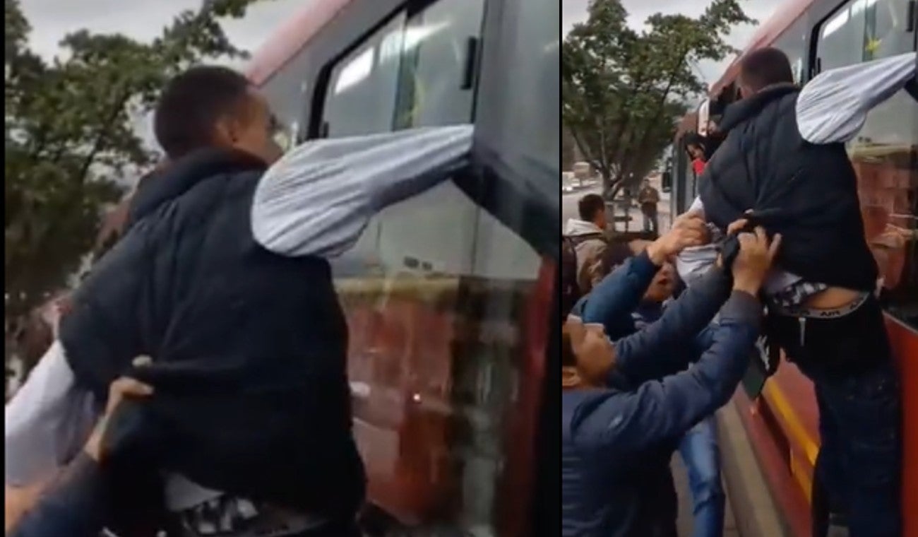 Ladrón quedó colgando del TransMilenio