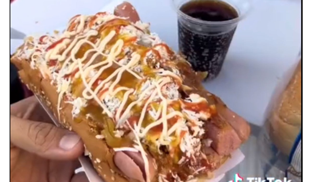 Perros calientes de siete salchichas a $7.000: La comida rápida que se volvió viral por su precio y sabor