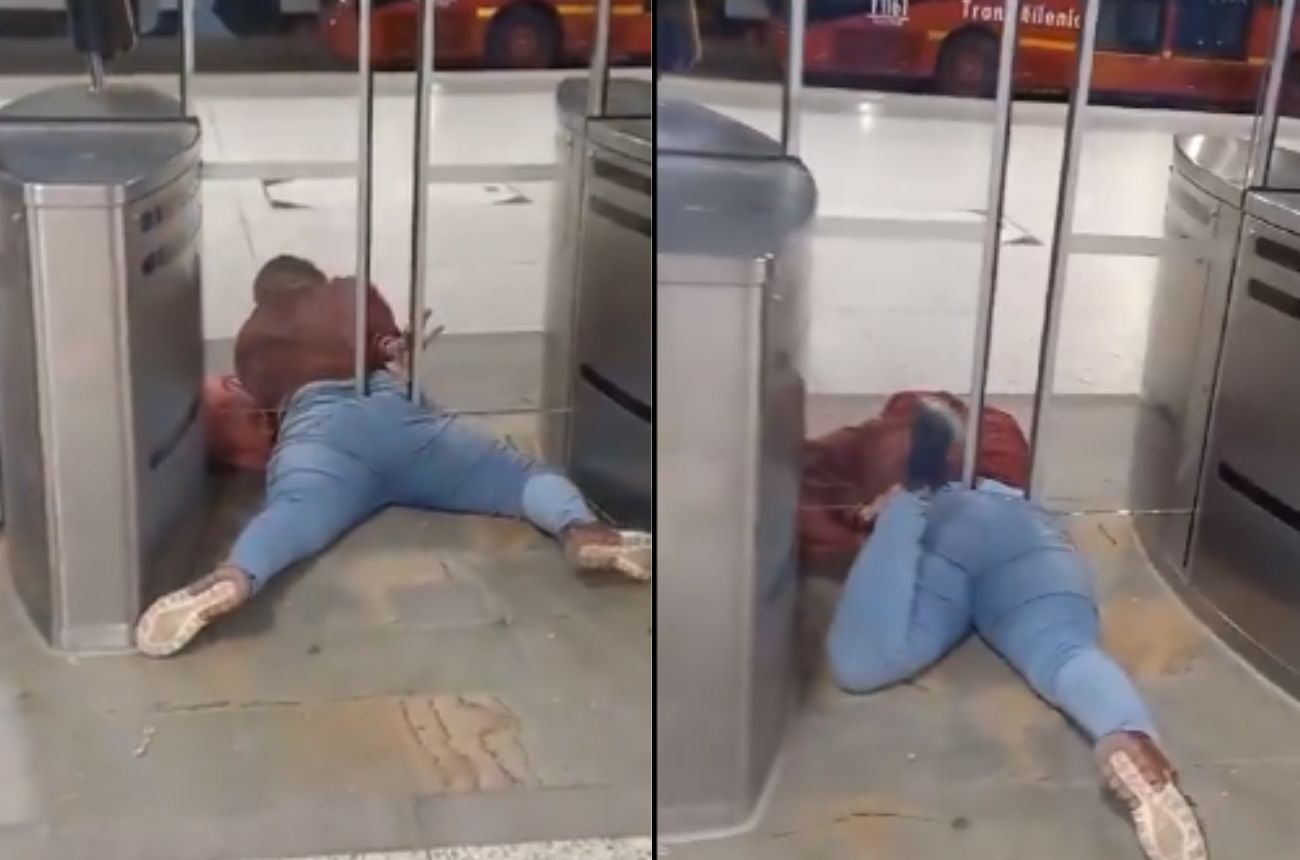 Mujer colándose en Transmilenio
