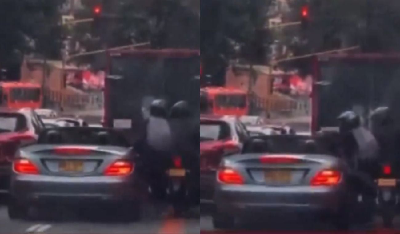 Ladrones en moto robando carro en Bogotá