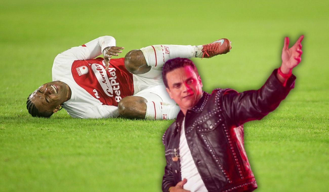 Jugador de Santa Fe con Silvestre Dangond