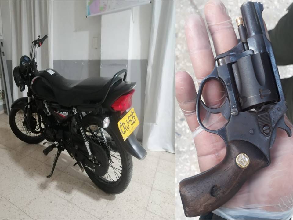 Revólver calibre 38, con dos (02) cartuchos percutidos y tres (03) sin percutir