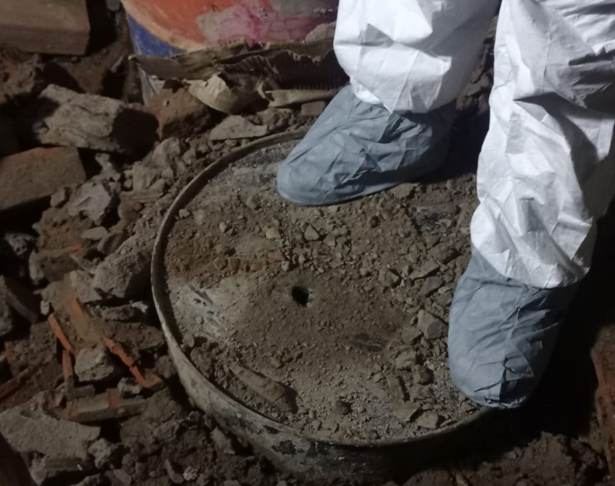 Caneca donde fue encontrado el cuerpo sin vida.