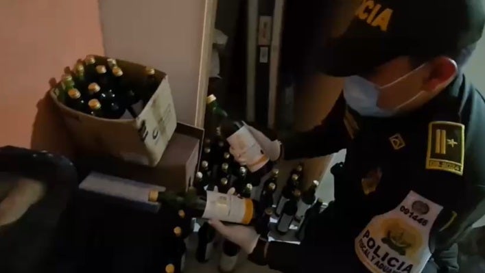 Policía - Licor adulterado