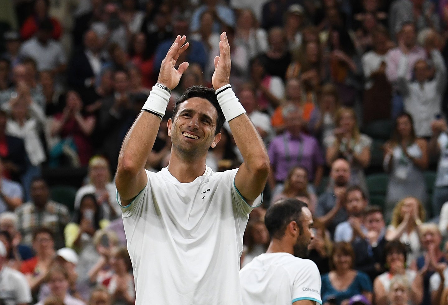 Robert Farah, tenista colombiano, en el All England Club de Londres. Al fondo su compañero Juan Sebastián Cabal