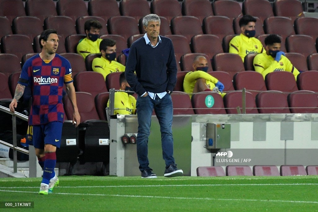 Quique Setién y Lionel Messi