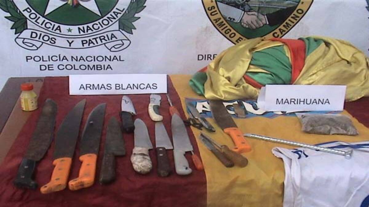 Hinchas armados de Tolima