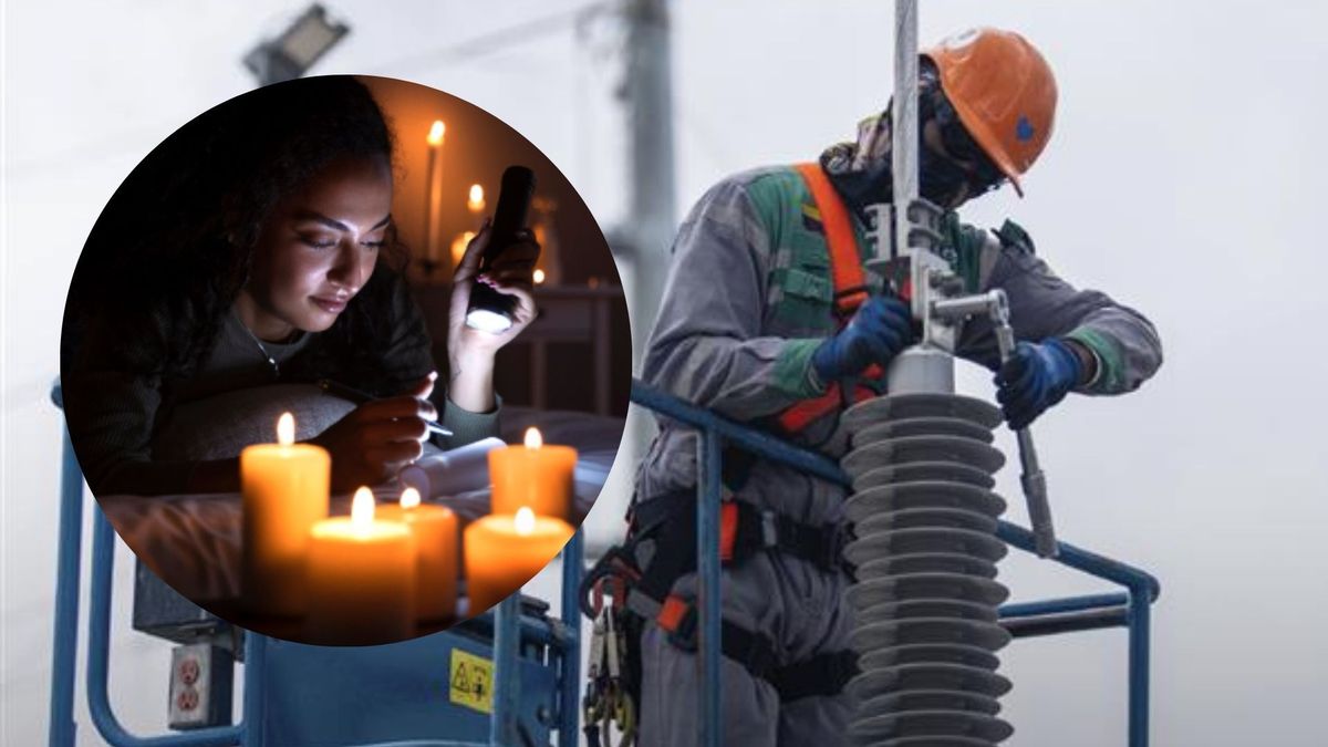 Mujer con una linterna y velas - trabajador de Enel Colombia
