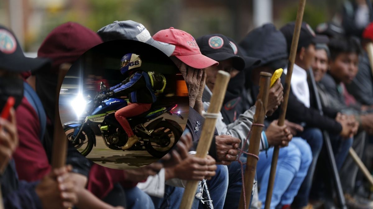 Indígenas Emberá y motociclista