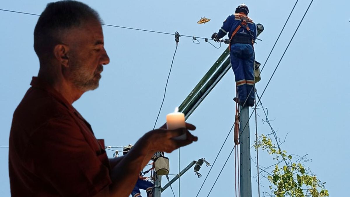 Técnicos de Enel - hombre con una vela