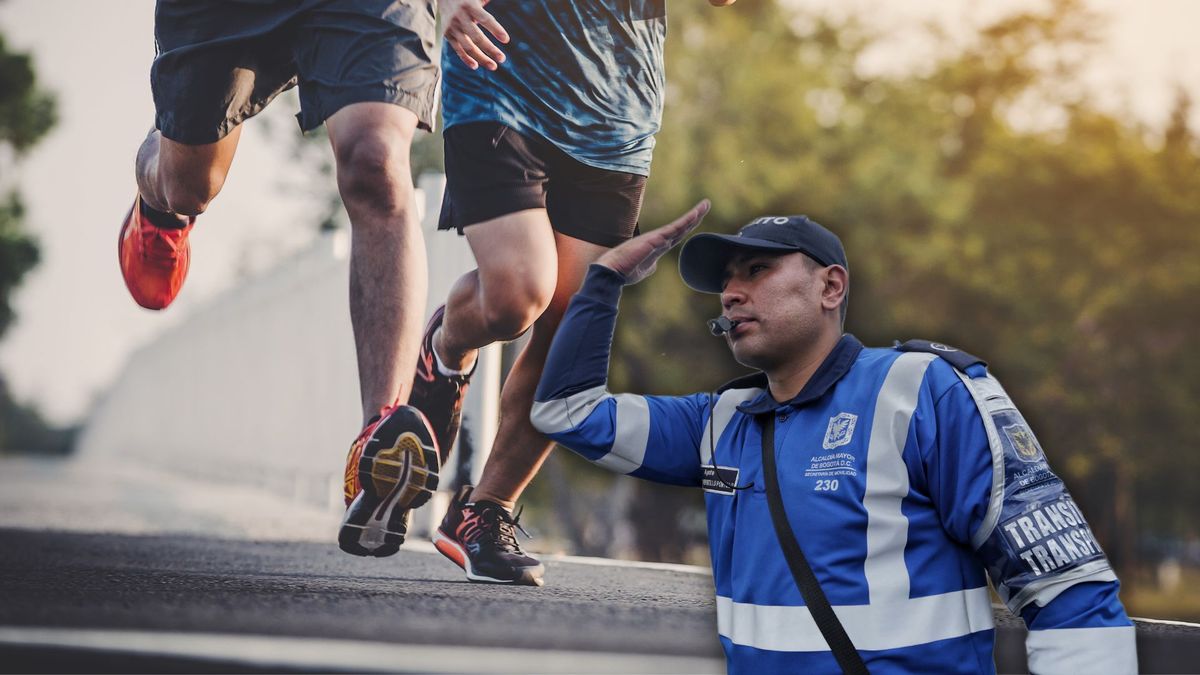 Deportistas corriendo y policía de tránsito en Bogotá