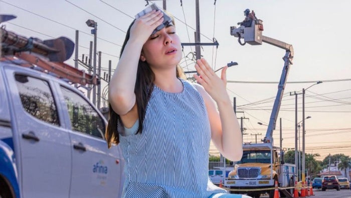 Técnicos de Afinia - mujer con calor