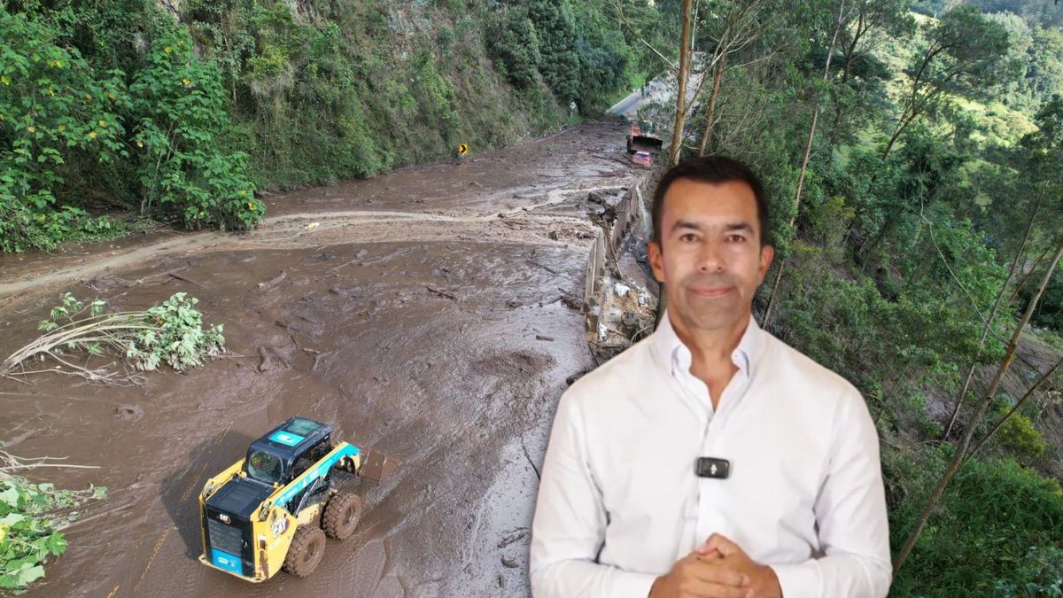 Jorge Rey y de fondo la vía Bogotá- La Mesa bloqueada