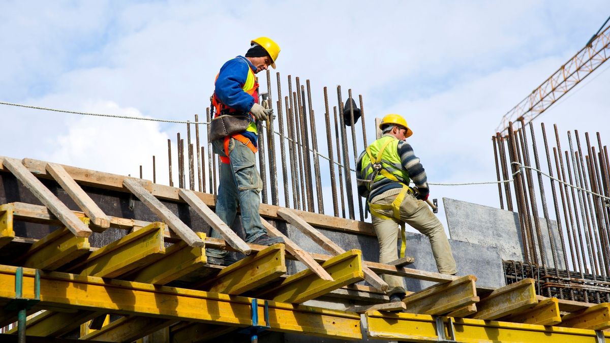 Trabajadores de obra de construcción