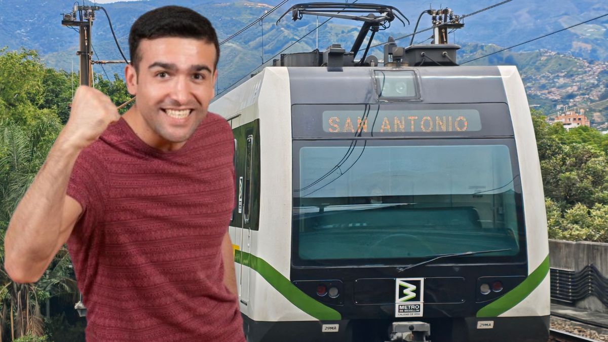 Metro de Medellín (fondo) - hombre feliz