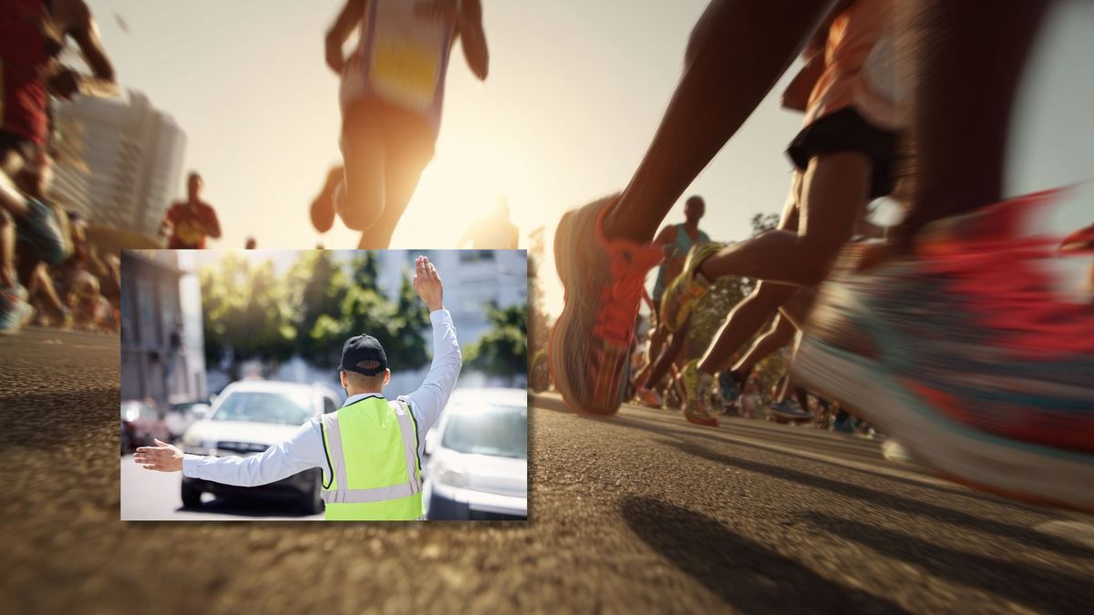 Corredores de running y agente de tránsito