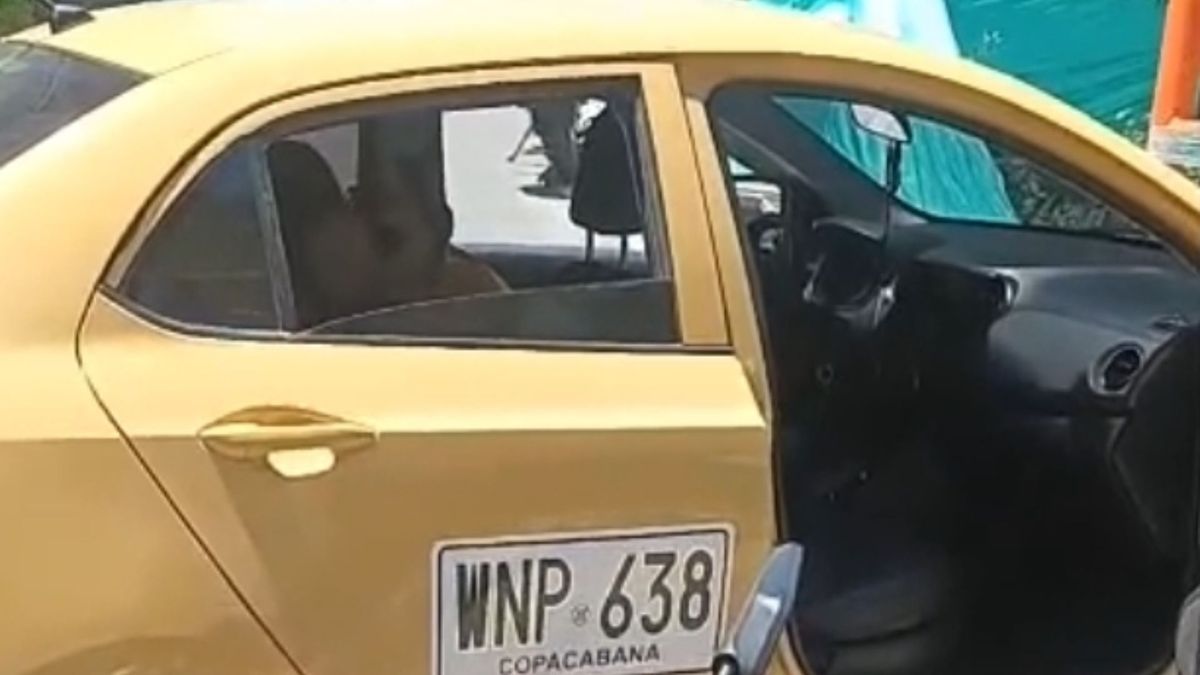 Taxi baleado por delincuentes en Copacabana